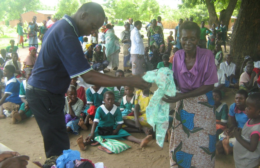 A beneficiary appreciating her donation