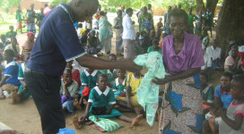 A beneficiary appreciating her donation