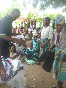 A old woman receiving her cloth